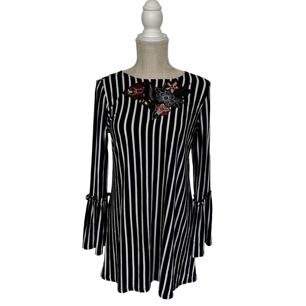 Black and white striped tunic with flowers in a size small